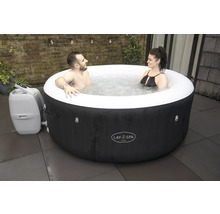 Jacuzzi gonflable Lay-Z-Spa Miami avec deux personnes dans l'eau.