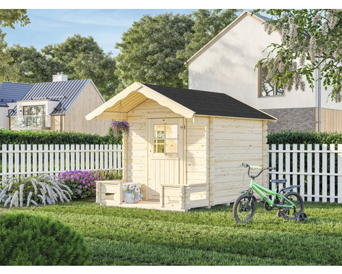 Spielhaus aus Holz mit Fahrrad im Garten