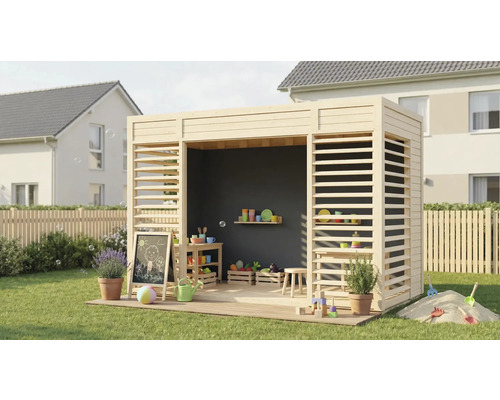 Maisonnette en bois avec tableau, jouets et plantes sur la pelouse