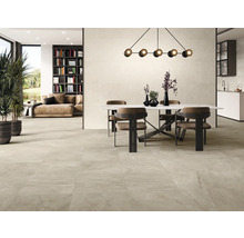 Séjour lumineux avec table à manger et carrelage.