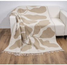 Couverture à motif floral sur un canapé