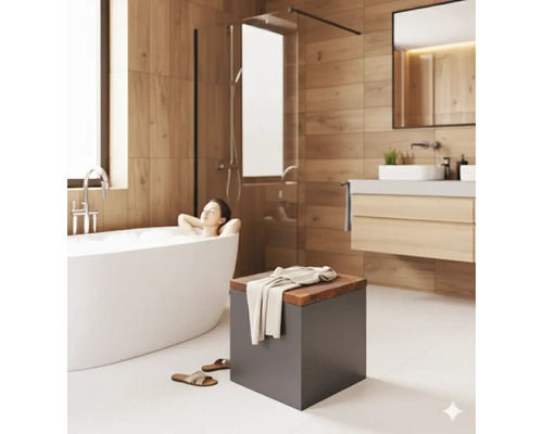 Badezimmer mit freistehender Badewanne, Waschtisch und Hocker