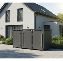 Mülltonnenbox aus Metall vor einem Haus