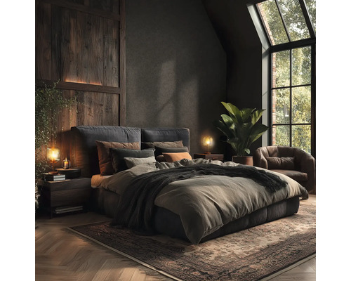 Chambre à coucher avec lit, tables de chevet, lampes, tapis et fauteuil dans des tons sombres