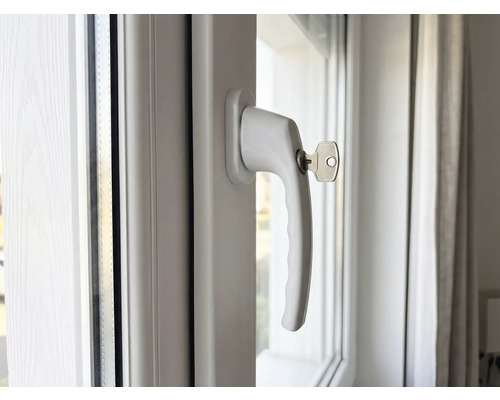 Fenêtre avec poignée de fenêtre et clé pour la sécurité de la fenêtre