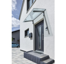 Entrée de maison avec auvent, porte d'entrée, boîte aux lettres et sonnette