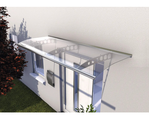 Auvent en métal et plastique transparent au-dessus d'une porte d'entrée