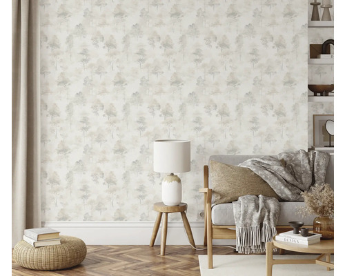 Espace de vie lumineux avec papier peint à motifs, canapé et décoration