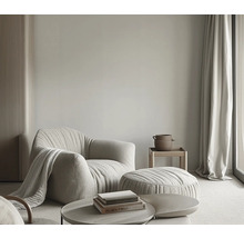 Salon avec fauteuil, pouf et table basse
