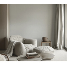 Salon avec fauteuil, tabouret et table