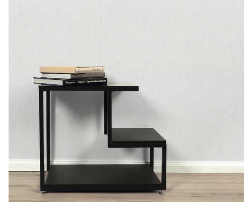 Table d'appoint noire à trois étagères avec des livres dessus