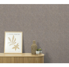 Gros plan d'un mur avec du papier peint textile