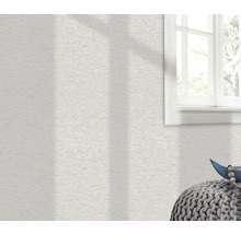 Mur avec papier peint texturé et fenêtre