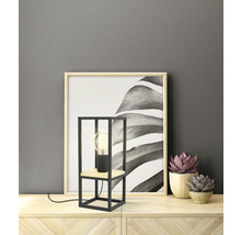 Dekorative Tischleuchte mit geometrischem Metallsockel und Holzelement