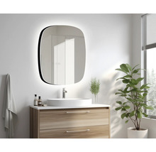 Badezimmer mit Waschtisch, Spiegel mit Beleuchtung und Zimmerpflanze.