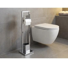 Toilettes avec porte-papier toilette autoportant et brosse de toilette dans la salle de bains