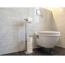 Salle de bains avec toilettes et porte-papier toilette en métal