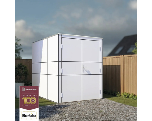 Armoire de jardin en métal sur une zone de gravier devant un jardin