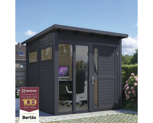 Abri de jardin moderne avec façade en verre et mobilier de bureau.