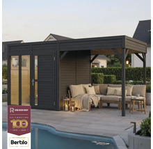 Abri de jardin avec coin salon et canapé d'angle sur terrasse