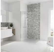 Salle de bains lumineuse avec lavabo, douche et carrelage gris aspect pierre