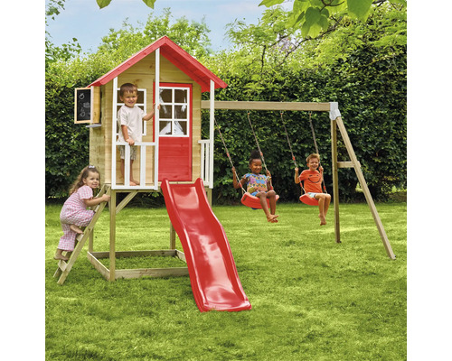 Maisonnette avec balançoire et toboggan pour enfants dans le jardin.