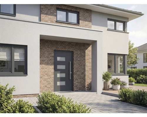 Modernes Haus mit Haustür, Fenstern und Backsteinfassade