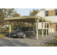 Un abri de voiture en bois avec une voiture et un vélo devant.