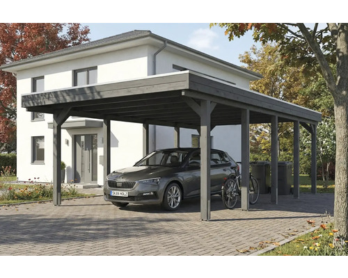 Carport aus Holz mit Auto und Fahrrad vor einem Haus