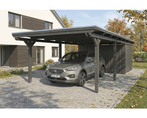 Auto unter einem dunklen Holzzaun mit Geräteschuppen