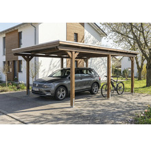 Carport en bois avec voiture et vélo dans la cour