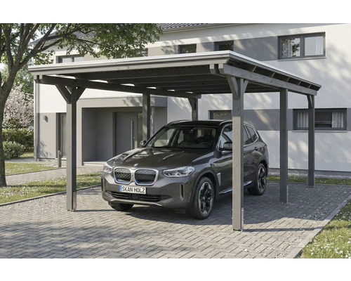 Carport aus Holz mit Auto davor