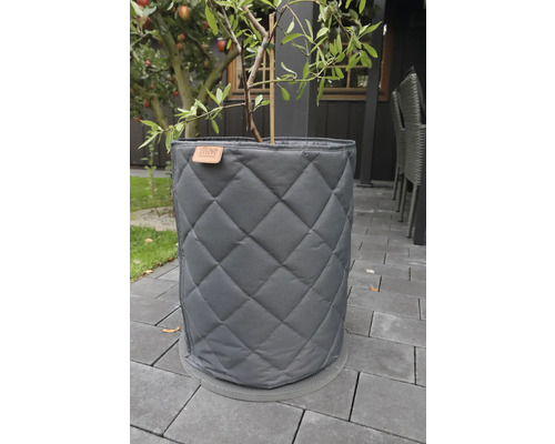 Pot de fleurs avec revêtement matelassé gris et support pour plantes