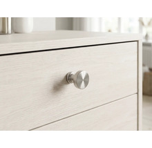 Nahaufnahme einer Kommode mit Schubladen und rundem Griff