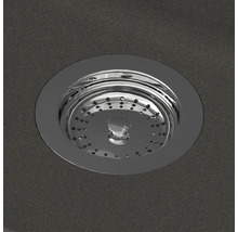 Crépine ronde en métal chromé pour l'évacuation d'un évier de cuisine.