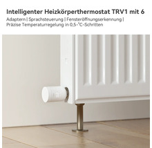 Thermostat de radiateur intelligent TRV1 sur un radiateur blanc avec affichage numérique pour un réglage précis de la température.
