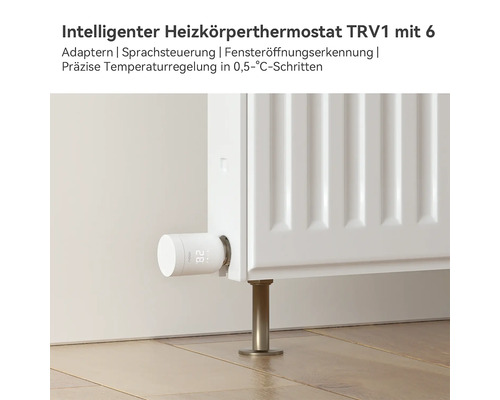 Thermostat de radiateur intelligent TRV1 sur un radiateur blanc avec affichage numérique pour un réglage précis de la température.