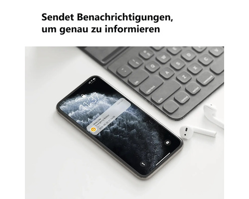 Smartphone zeigt eine Benachrichtigung für einen Notfall-Button auf dem Display neben einer Tastatur und kabellosen Kopfhörern.