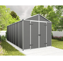 Abri de jardin moderne en métal avec toit à deux versants et double porte anthracite sur une fondation dans un jardin.