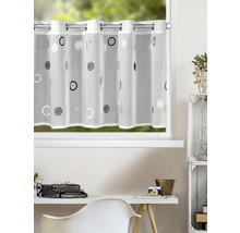Rideau bistrot transparent avec œillets et motif à cercles moderne devant une fenêtre dans un bureau clair et organisé.