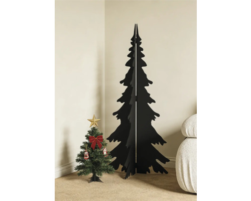 Sapin de Noël minimaliste noir en bois à côté d'un petit sapin artificiel décoré dans le coin d'une pièce lumineuse.