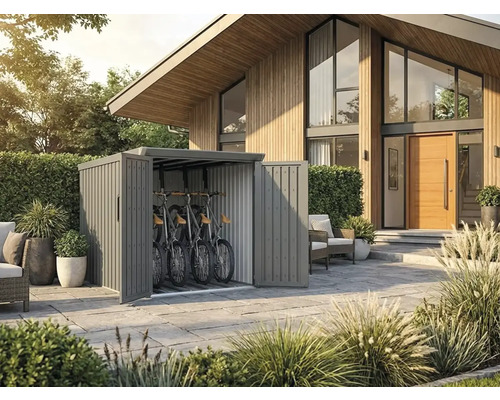 Moderne Fahrradbox aus Metall mit Platz für drei Fahrräder auf einer gepflasterten Terrasse vor einem Haus mit Holzfassade.