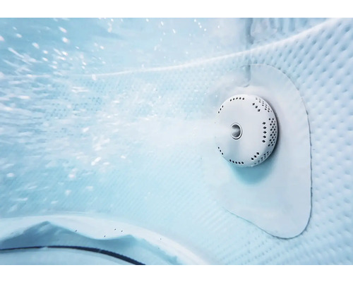 Buse de spa en fonctionnement avec jet d'eau et bulles d'air.