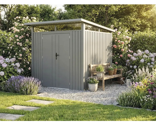Abri de jardin moderne en métal avec toit en pente et double porte dans un jardin fleuri à côté d un banc en bois.