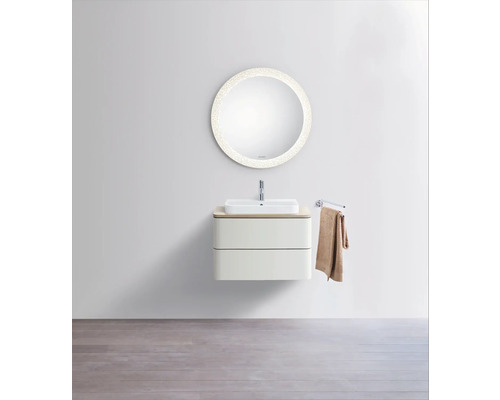 Moderner Waschplatz mit rundem Spiegel, weißem Aufsatzwaschbecken und wandhängendem Unterschrank mit zwei Schubladen in hellem Design.