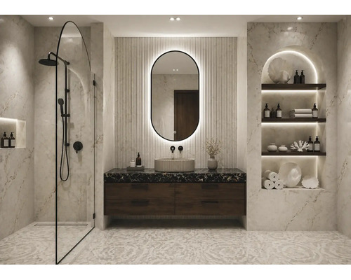 Salle de bains moderne avec murs en marbre, douche à l'italienne, meuble sous-vasque sombre, miroir ovale rétroéclairé et niche éclairée.