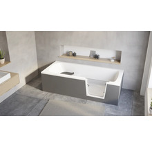 Baignoire moderne avec porte d accès intégrée et insert en verre dans une salle de bain au design minimaliste avec niche murale.