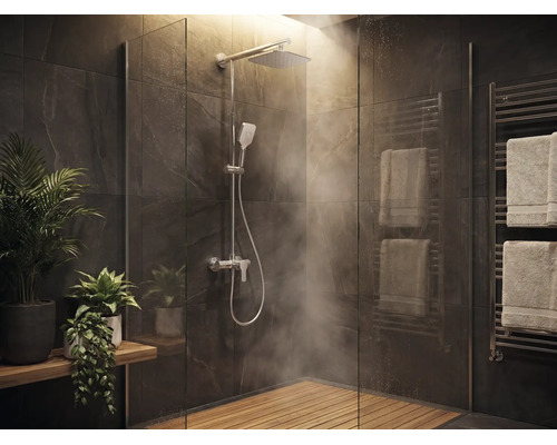 Salle de bains moderne avec douche à l'italienne, douche de tête, caillebotis en bois, carrelage effet pierre, radiateur sèche-serviettes et plantes.