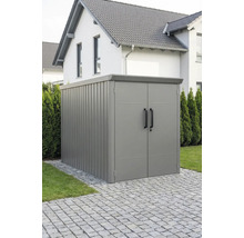 Armoire de jardin moderne en métal avec double porte et toit plat, posée sur un sol pavé.