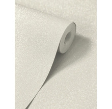 Rouleau de papier peint structuré avec effet pailleté.